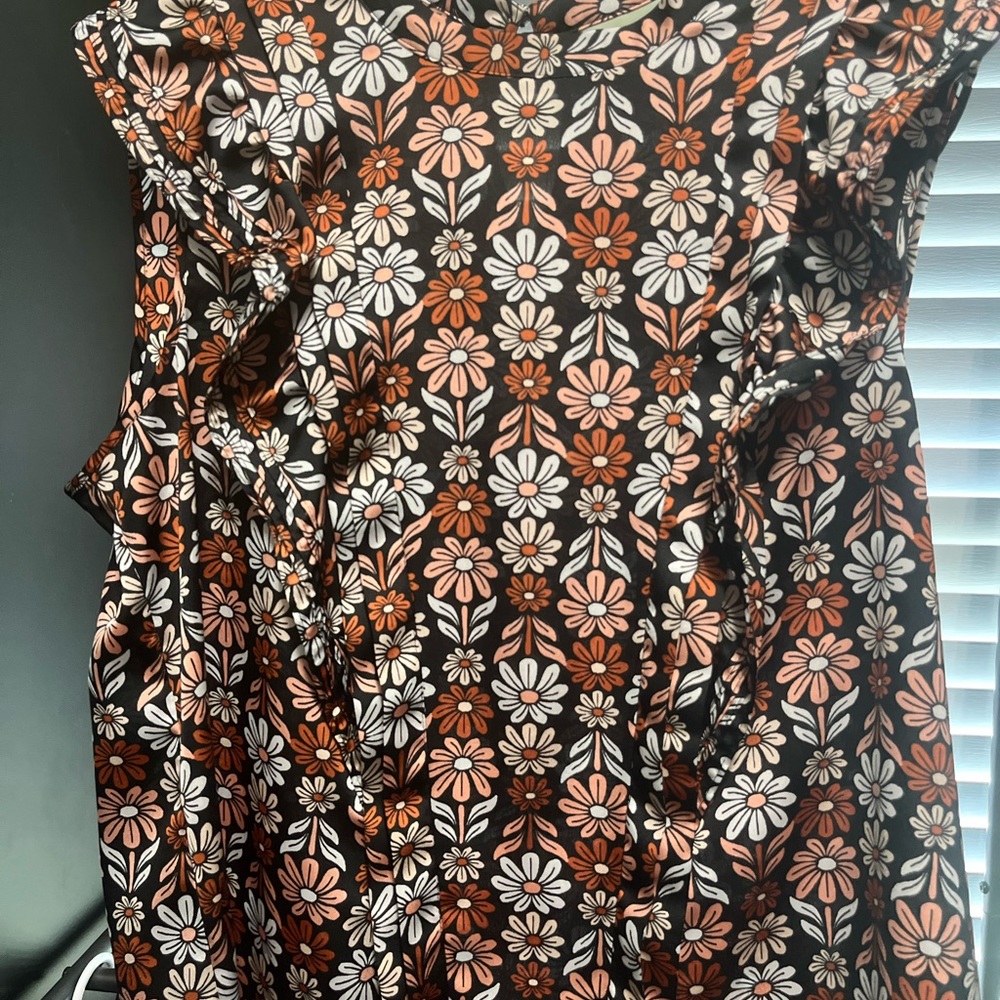 Floral sleeveless ruffles front blouse